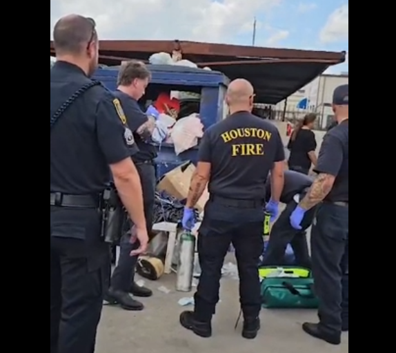 first responders on the scene when baby is found in dumpster
